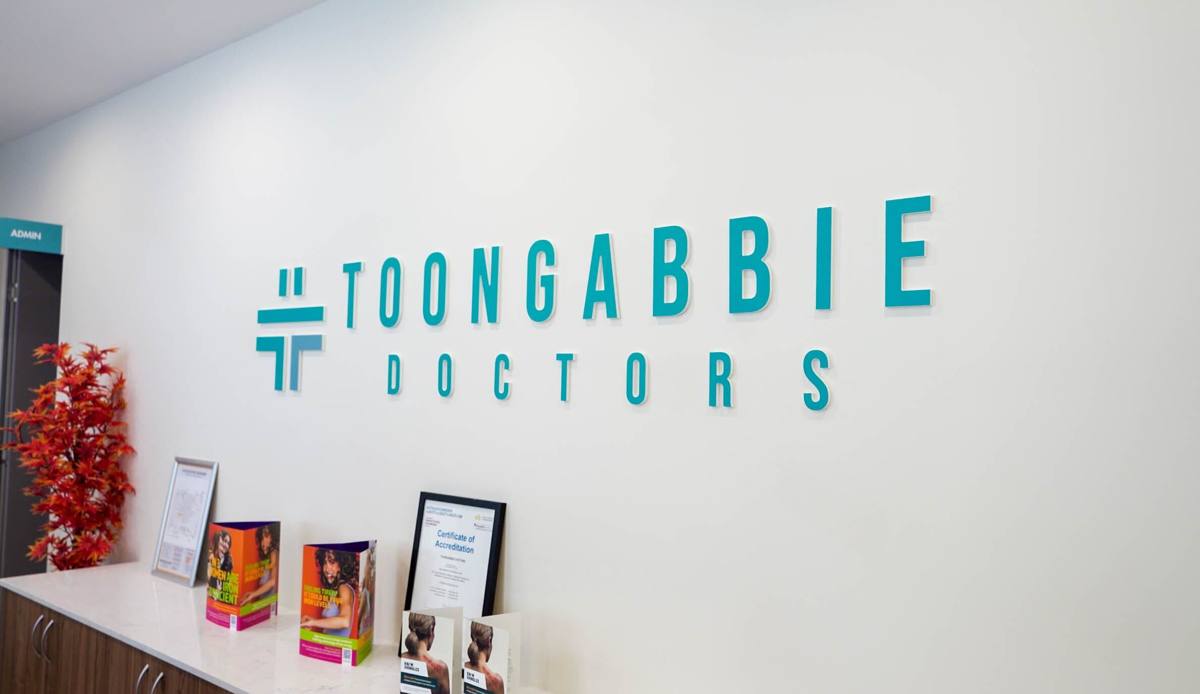 Toongabbie Doctors logo wall